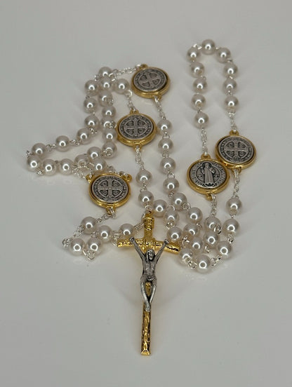 Saint Benedict Rosary It is made with pearl-colored beads.